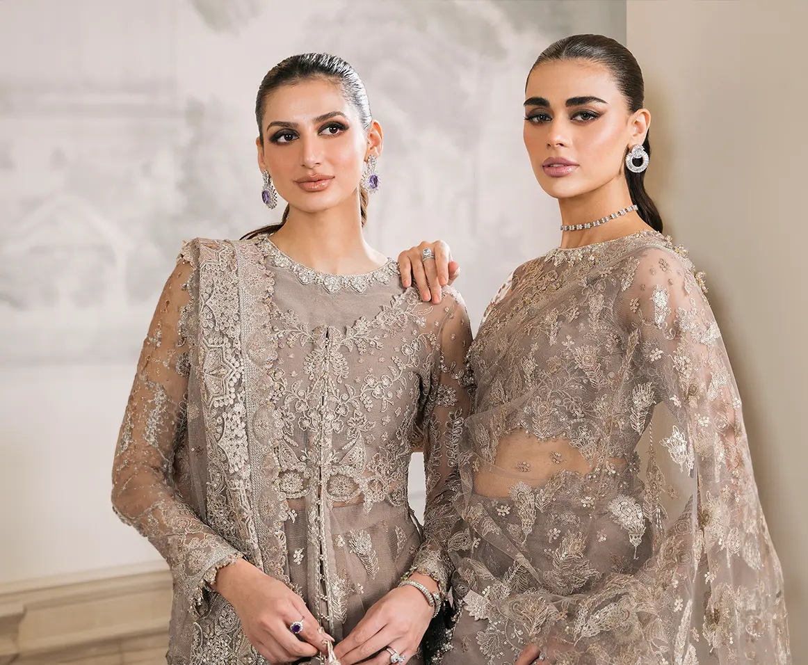 An image of two models wearing pakistani designer wear @SearchNerve